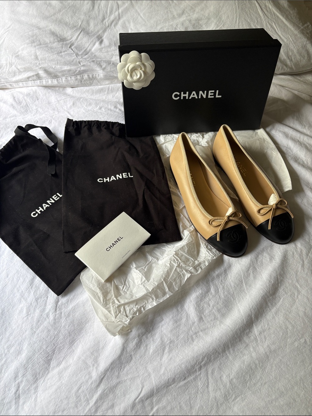CHANEL Beige and Black Cap-Toe Leather Ballet Flats - Picture 1 of 5